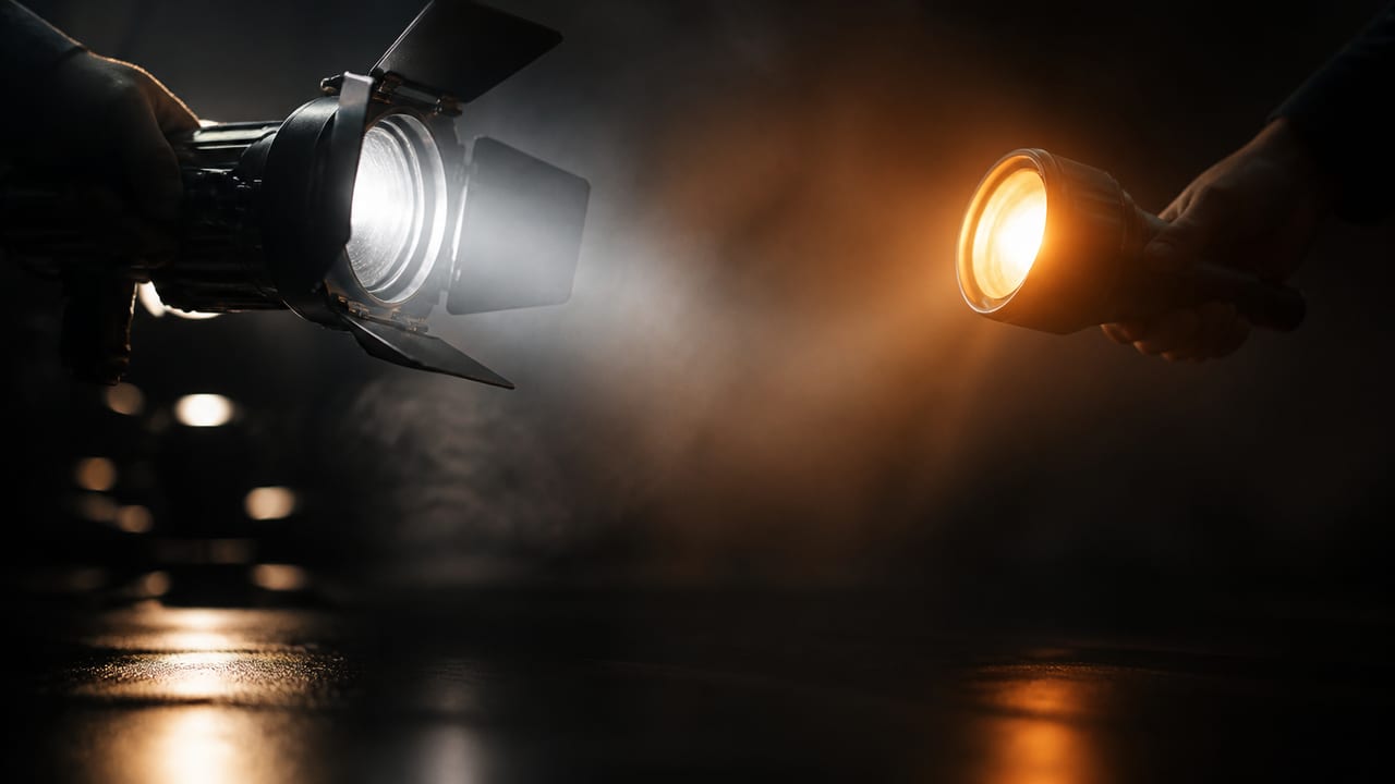 Cinematic abstract still representing AI ad creative compared with UGC